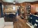 Cozy living and dining area with beautiful wood accents and a modern kitchen in the background at 514 Palm St., Georgetown, SC 29440