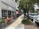 Charming tree-lined street featuring shops and outdoor seating at 514 Palm St., Georgetown, SC 29440