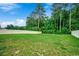 Large backyard with fence, grass and mature trees at 5153 Country Pine Dr., Myrtle Beach, SC 29579
