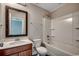 Neutral bathroom featuring a vanity, framed mirror and shower-tub combo at 5153 Country Pine Dr., Myrtle Beach, SC 29579