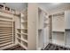 Walk-in closet featuring built-in shelving, drawers, and ample space for organized storage at 5153 Country Pine Dr., Myrtle Beach, SC 29579