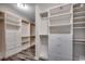 Large walk-in closet with built-in shelving and drawers, maximizing storage and organization at 5153 Country Pine Dr., Myrtle Beach, SC 29579