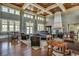 Spacious lobby with high ceilings, fireplace, comfortable seating, and tables for games at 5153 Country Pine Dr., Myrtle Beach, SC 29579