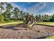 Community playground with slides, climbing structures, and a soft mulch ground covering at 5153 Country Pine Dr., Myrtle Beach, SC 29579