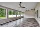 Relaxing sunroom featuring lots of windows for natural light and backyard views at 5153 Country Pine Dr., Myrtle Beach, SC 29579