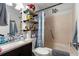 Bathroom featuring an updated vanity, tiled shower, and plenty of storage space at 517 Cardinal Dr., Conway, SC 29526