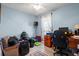 Office space with clutter features black bags, a desk, and a swivel chair at 517 Cardinal Dr., Conway, SC 29526