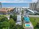 Aerial view capturing the home's proximity to the beach, nearby buildings, and a refreshing pool at 5407 N Ocean Blvd., Myrtle Beach, SC 29577