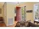 Welcoming entryway featuring a red door, a decorative shelf, and a glimpse of the outdoors at 5407 N Ocean Blvd., Myrtle Beach, SC 29577
