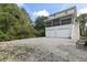 House exterior with a two-car garage and ample parking space at 5407 N Ocean Blvd., Myrtle Beach, SC 29577