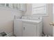 Bright laundry room featuring a washing machine and dryer set at 5407 N Ocean Blvd., Myrtle Beach, SC 29577