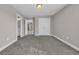 Bedroom featuring soft carpeting, a double closet, and access to a private bathroom at 5621 Camilla Ct., Myrtle Beach, SC 29579