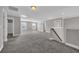 Spacious bonus room with soft carpeting, natural light from windows, and convenient hallway access at 5621 Camilla Ct., Myrtle Beach, SC 29579