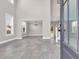 Grand entryway featuring soaring ceilings, elegant chandelier, and beautiful tile flooring at 5621 Camilla Ct., Myrtle Beach, SC 29579
