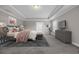 Comfortable bedroom featuring a large bed, neutral tones, and soft carpeting at 5621 Camilla Ct., Myrtle Beach, SC 29579