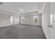 Large bedroom with tray ceiling, carpet and natural light at 5621 Camilla Ct., Myrtle Beach, SC 29579