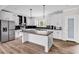 Spacious kitchen featuring white cabinets, stainless appliances, center island, and a pantry at 565 Kent Rd., Georgetown, SC 29440