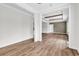 Open-concept living area with wood-look floors and beamed ceiling at 565 Kent Rd., Georgetown, SC 29440