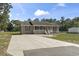 Long driveway leads to this well-kept home with a welcoming front porch at 568 Rosedale Dr., Aynor, SC 29511