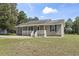 Charming home with a welcoming front porch and well-maintained lawn at 568 Rosedale Dr., Aynor, SC 29511