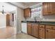 View of the kitchen, sink and cabinets with a view into the living room at 568 Rosedale Dr., Aynor, SC 29511