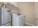 Laundry room featuring water heater, washing machine, and dryer at 568 Rosedale Dr., Aynor, SC 29511