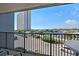 Enjoy the view of a parking lot, waterway, palm trees, and the neighboring tower at 5905 S Kings Hwy. # 242B, Myrtle Beach, SC 29575