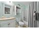 Bathroom featuring a vanity, toilet, and shower-tub combination at 5905 S Kings Hwy. # 242B, Myrtle Beach, SC 29575