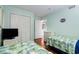 Bedroom with a TV, twin beds, and a closet space at 5905 S Kings Hwy. # 242B, Myrtle Beach, SC 29575