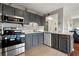 Updated kitchen featuring stone countertops and modern appliances at 5905 S Kings Hwy. # 242B, Myrtle Beach, SC 29575