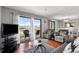 Living room showcases a balcony with stunning waterfront views at 5905 S Kings Hwy. # 242B, Myrtle Beach, SC 29575