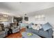 Inviting living room with ample seating, adjacent to a modern kitchen at 5905 S Kings Hwy. # 242B, Myrtle Beach, SC 29575