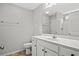 Neutral bathroom with modern vanity, framed mirror and ceramic tile floors at 600 Woodside Dr., Conway, SC 29526