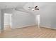 Spacious living room with plank flooring, high ceilings, and neutral paint at 600 Woodside Dr., Conway, SC 29526