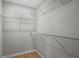 Walk-in closet with multiple wire shelves and laminate flooring at 600 Woodside Dr., Conway, SC 29526