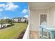 Balcony shows a blue patio table with seats and views of the community pool at 604 Heathrow Dr. # 1101, Myrtle Beach, SC 29579