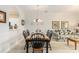 Dining room with seating for six and pass-through to kitchen at 604 Heathrow Dr. # 1101, Myrtle Beach, SC 29579