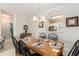 Dining room with seating for six and view into the kitchen at 604 Heathrow Dr. # 1101, Myrtle Beach, SC 29579
