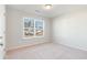 Cozy bedroom with plush carpet and natural light at 605 Lightwood Dr., Conway, SC 29526