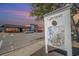 Street view with local businesses and a 'City of Conway' informational sign, fostering a strong community identity at 605 Lightwood Dr., Conway, SC 29526