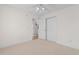 Bright bedroom featuring neutral carpet, a ceiling fan, a closet and an ensuite bathroom at 613B 3Rd Ave. S, North Myrtle Beach, SC 29582