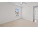 Bright bedroom with a ceiling fan and a window that provides natural light at 613B 3Rd Ave. S, North Myrtle Beach, SC 29582