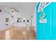 Bright living room with hardwood floors and view to kitchen at 613B 3Rd Ave. S, North Myrtle Beach, SC 29582