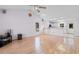 Open concept living room with hardwood floors and open to kitchen at 613B 3Rd Ave. S, North Myrtle Beach, SC 29582