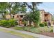Charming condo exterior showcasing lush greenery, a well-kept lawn, and a welcoming neighborhood at 614 15Th Ave. S # 41, Surfside Beach, SC 29575