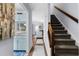 Spacious hallway leading to kitchen, living area, and staircase, providing a seamless flow at 614 15Th Ave. S # 41, Surfside Beach, SC 29575