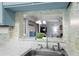 A serving hatch provides a view from the kitchen to the living room beyond at 614 15Th Ave. S # 41, Surfside Beach, SC 29575
