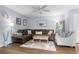 Relaxing living room featuring a brown leather sectional and hardwood floors, perfect for gatherings at 614 15Th Ave. S # 41, Surfside Beach, SC 29575