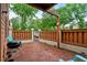 Private patio with wood fencing and a BBQ grill, perfect for outdoor relaxation at 614 15Th Ave. S # 41, Surfside Beach, SC 29575