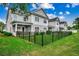 This fenced backyard offers a great view of the home with a covered porch to relax on at 620 Lorenzo Dr. # 620, North Myrtle Beach, SC 29582